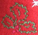 Embroidered holly leaves design