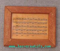 Small wood picture frame with music score